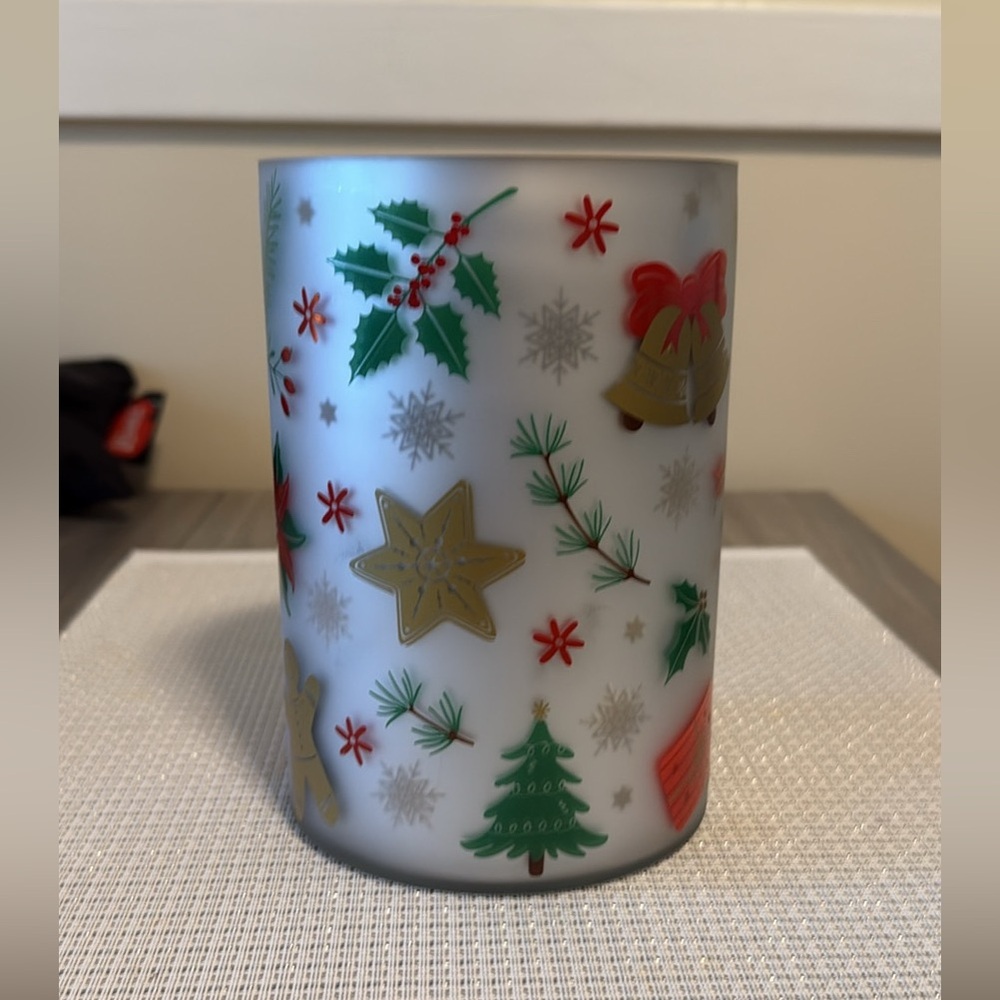 Yankee Candle Holiday Decor with Red, Green, and Gold Accents